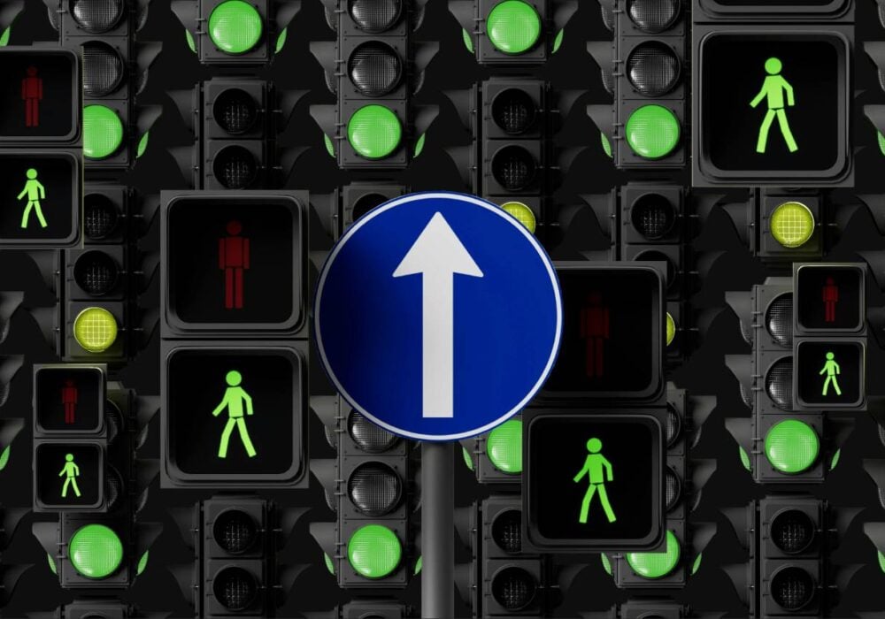 Traffic signals with pedestrian indicators.