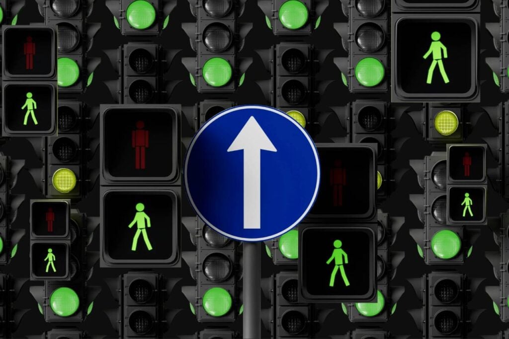 Traffic signals with pedestrian indicators.